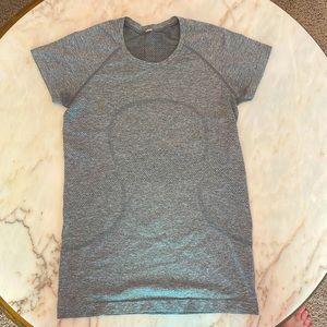i’m selling a Lululemon Swiftly Tech shirt. size 8, color is heather grey.
